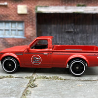 Loose Hot Wheels Datsun 620 Mini Truck - NGK Primer Red