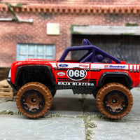 Loose Hot Wheels Ford Bronco 4×4 Dressed in Red #68 Baja Blazers Livery