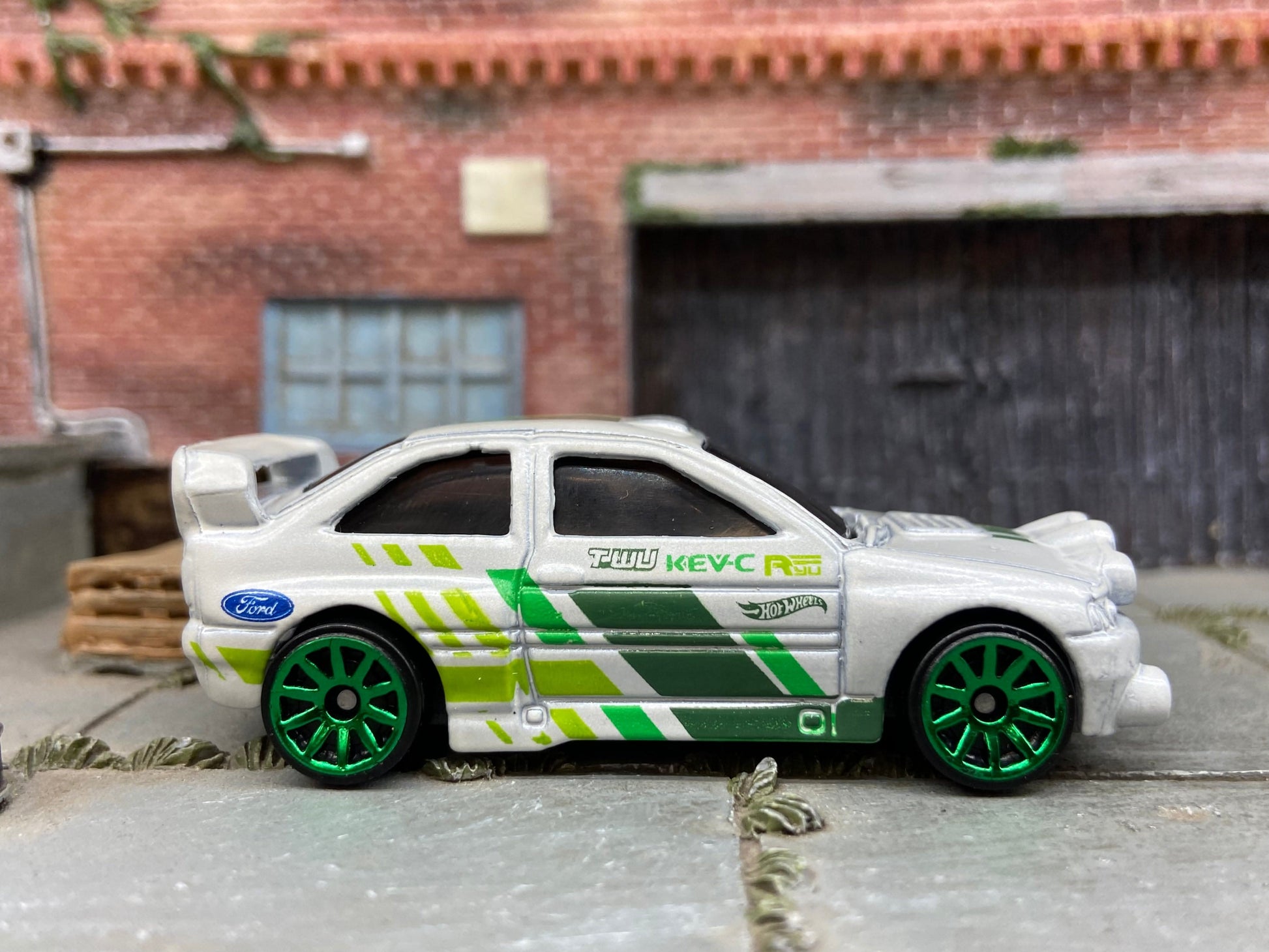 Loose Hot Wheels Ford Escort Rally Dressed in White and Green Race Livery