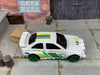 Loose Hot Wheels Ford Escort Rally Dressed in White and Green Race Livery
