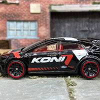 Loose Hot Wheels Ford Fucus RS Dressed in Koni Black Livery