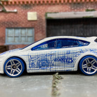 Loose Hot Wheels Ford Fucus RS Dressed in White and Blue Graphics