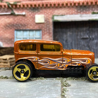 Loose Hot Wheels Ford Model A Sedan Midnight Otto Dressed in Orange with Flames