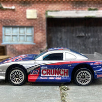 Loose Hot Wheels Ford Mustang Cobra Race Car Dressed in Nestle Crunch White and Blue Livery
