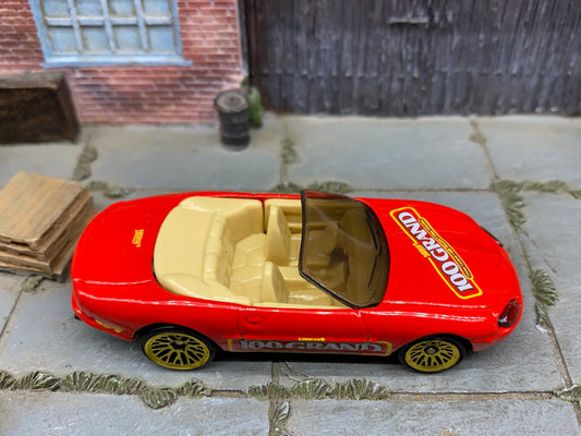 Loose Hot Wheels Jaguare XK8 - 100 Grand Red