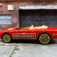 Loose Hot Wheels Jaguare XK8 - 100 Grand Red