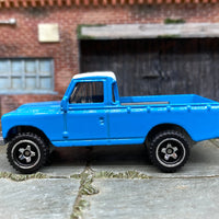 Loose Hot Wheels Land Rover Series III in Blue and Whtie Off Road