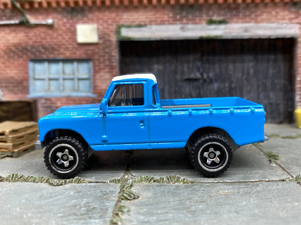 Loose Hot Wheels Land Rover Series III in Blue and Whtie Off Road