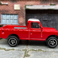 Loose Hot Wheels Land Rover Series III in Red and White Off Road