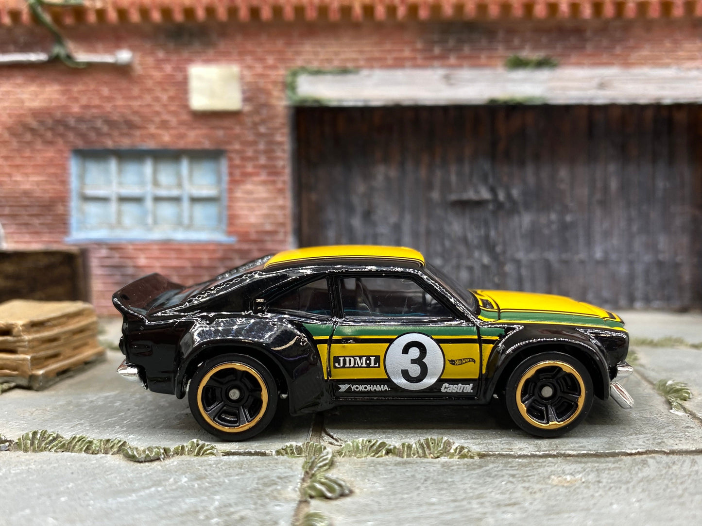 Loose Hot Wheels - Mazda RX-3 - Black, Green and Yellow 3