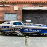 Loose Hot Wheels Nash Metrorail Drag Car Dressed in Silver, Black and Blue Pursuit Livery
