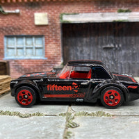 Loose Hot Wheels Nissan Fairlady 2000 - Black and Red 52