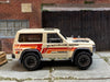 Loose Hot Wheels - Nissan Patrol 4X4 - Off White and Orange