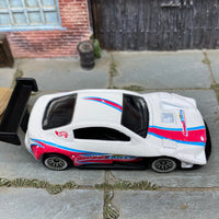 Loose Hot Wheels Pikes Peak Toyota Celica Race Car - White, Pink and Blue SweetTarts