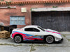 Loose Hot Wheels Pikes Peak Toyota Celica Race Car - White, Pink and Blue SweetTarts