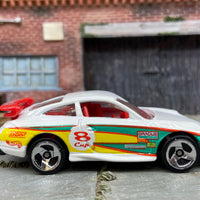 Loose Hot Wheels Porsche 911 GT3 CUP Dressed in White, Red, Yellow and Green