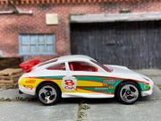 Loose Hot Wheels Porsche 911 GT3 CUP Dressed in White, Red, Yellow and Green