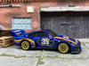 Loose Hot Wheels - Porsche 935 - Blue, Yellow and Pink Goodyear 35