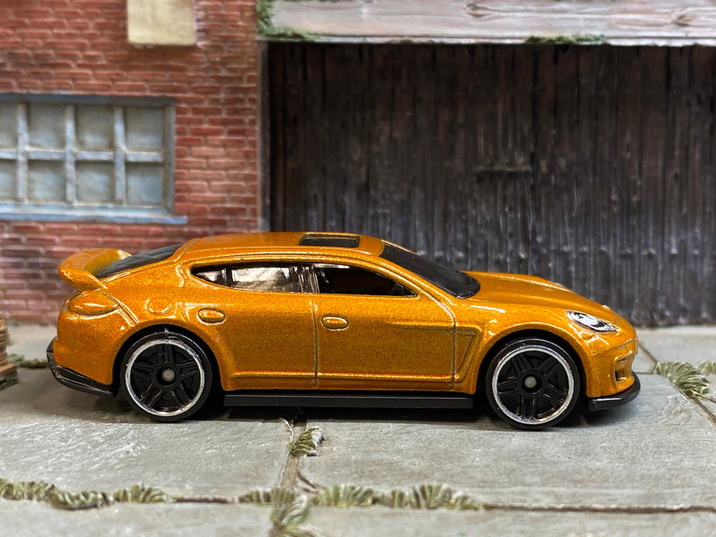 Loose Hot Wheels Porsche Panamera Gold Muncle Mikes
