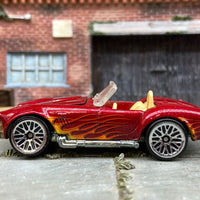 Loose Hot Wheels Shelby Cobra 427 S/C Dressed in Dark Red With Flames