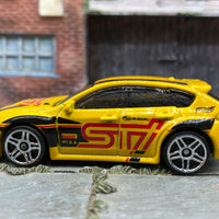 Loose Hot Wheels Subaru WRX STI - Yellow, Black and Red