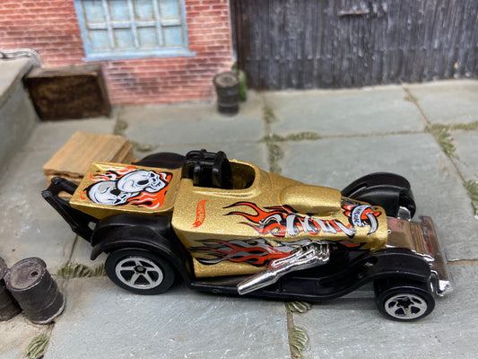Loose Hot Wheels Super Comp Dragster Dressed in Gold with Flames and Skulls