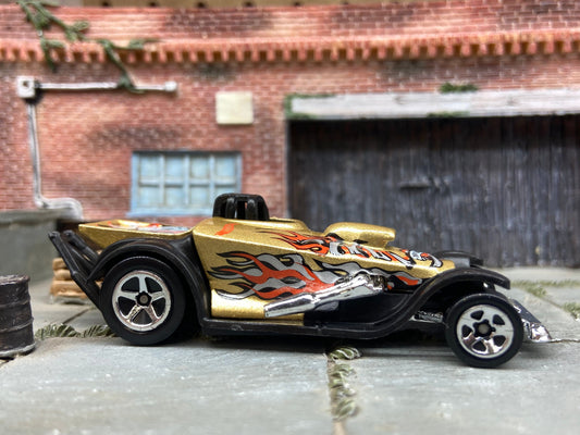 Loose Hot Wheels Super Comp Dragster Dressed in Gold with Flames and Skulls