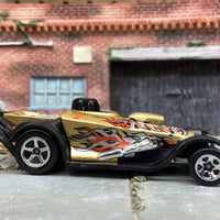 Loose Hot Wheels Super Comp Dragster Dressed in Gold with Flames and Skulls