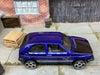 Loose Hot Wheels: VW Volkswagen Golf Dressed in Blue and Black
