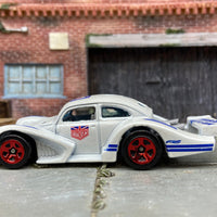 Loose Hot Wheels: VW Volkswagen Kafer Racer Race Car Dressed in Urban Outlaw Red, White and Blue Livery