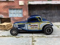 Matchbox 1933 Ford Coupe Blue, White and Yellow Matchbox Speed Shop - rear angle view showing tampo details