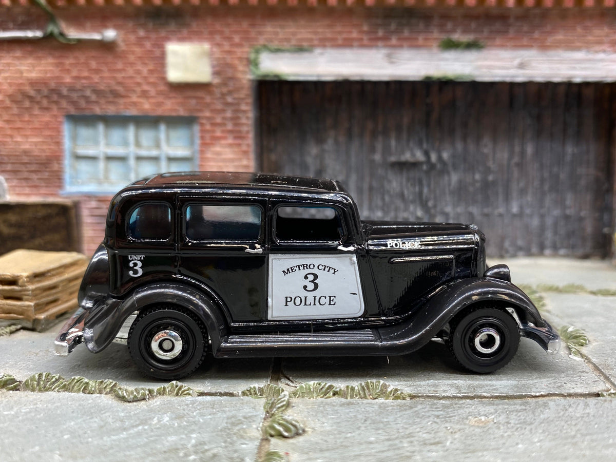 Matchbox 1933 Plymouth in Black and White Police, loose diecast car