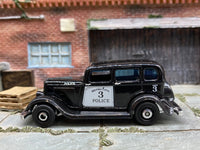 Matchbox 1933 Plymouth Black and White Police loose diecast - side profile detail shot