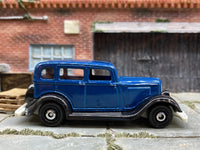 Matchbox 1933 Plymouth Blue and Black - rear angle view showing tampo details