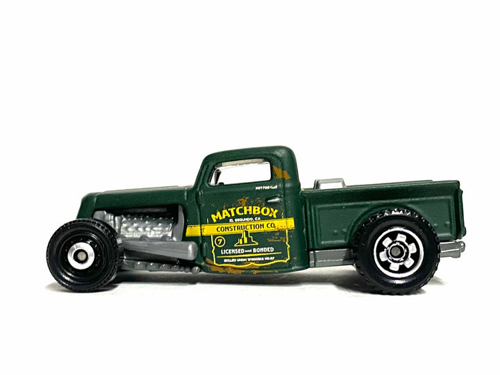 Matchbox 1935 Ford Pick Up Truck in Satin Green Matchbox Construction Livery, loose diecast car