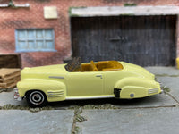 Matchbox 1941 Cadillac Series 62 Light Yellow - rear angle view showing tampo details