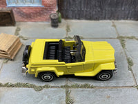 Matchbox 1941 Willys Jeepster Yellow - rear angle view showing tampo details