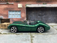 Matchbox 1956 Aston Martin DBR1 Convertible Dark Green - rear angle view showing tampo details