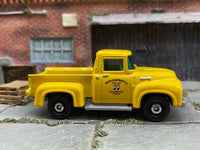 Matchbox 1956 Ford Pickup Yellow Mooneyes Livery - rear angle view showing tampo details