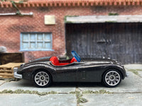 Matchbox 1956 Jaguare XK140 Convertible Dark Gray Metallic - rear angle view showing tampo details