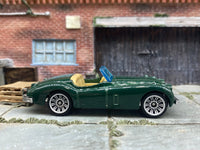 Matchbox 1956 Jaguare XK140 Convertible Dark Green - rear angle view showing tampo details