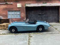 Matchbox 1956 Jaguare XK140 Convertible Light Blue - rear angle view showing tampo details