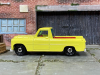 Matchbox 1956 Powell Sport Pick Up Truck Yellow - rear angle view showing tampo details