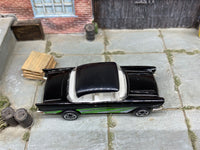 Matchbox 1957 Chevrolet Black, Green and Silver loose diecast - side profile detail shot