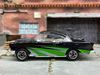 Matchbox 1957 Chevrolet Black, Green and Silver - rear angle view showing tampo details