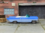 Matchbox 1957 Lincoln Premiere Convertible blue and white loose diecast - gallery image 1 of 3
