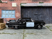 Matchbox 1959 Dodge Coronet Police Black and White Police Chief - rear angle view showing tampo details