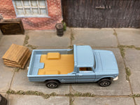 Matchbox 1962 Nissan Junior Mini Truck Light Blue loose diecast - side profile detail shot