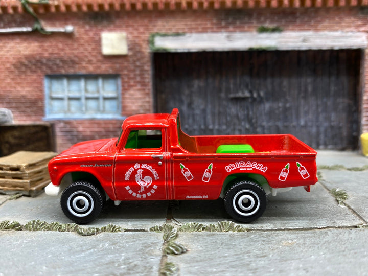 Matchbox 1962 Nissan Junior Mini Truck in Red, White and Green, loose diecast car
