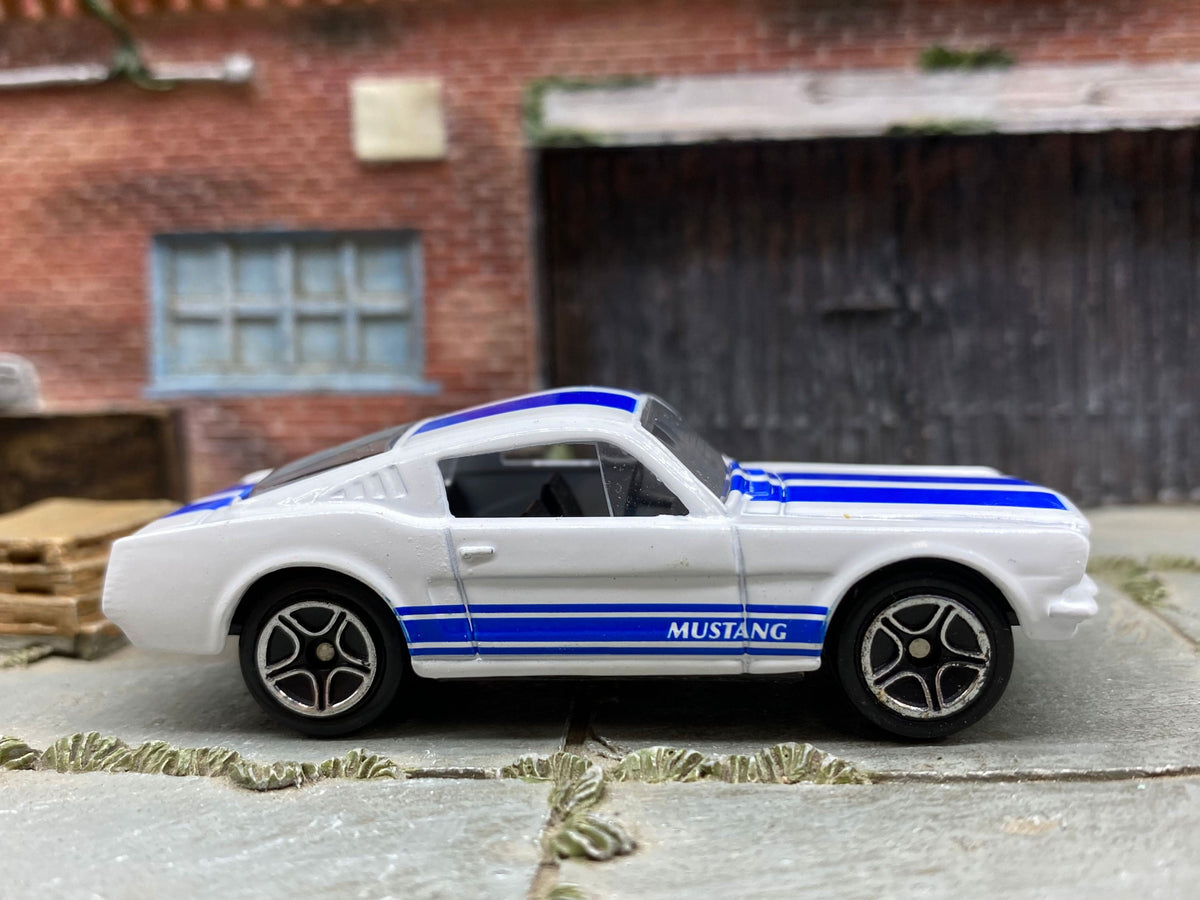 Matchbox 1965 Ford Mustang GT (Fastback) in White and Blue, loose diecast car